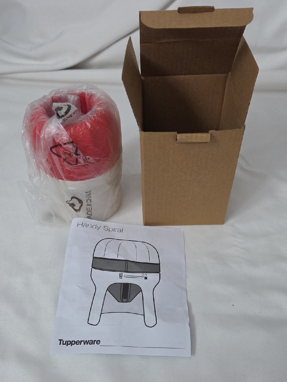 Tupperware Red and White Handy Veggie Spiralizer.